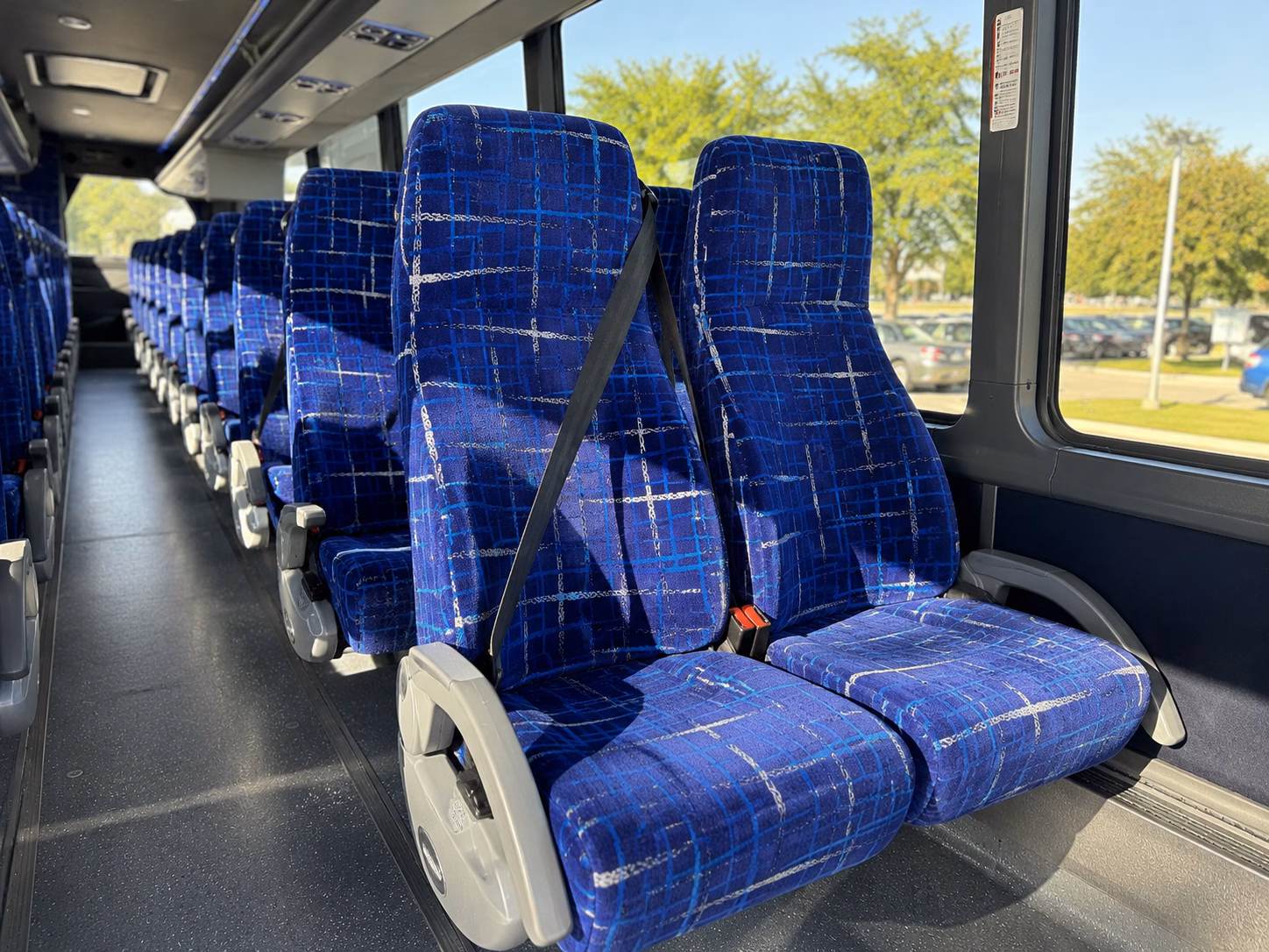 how seasonality and peak times affect charter bus prices in pontiac michigan
